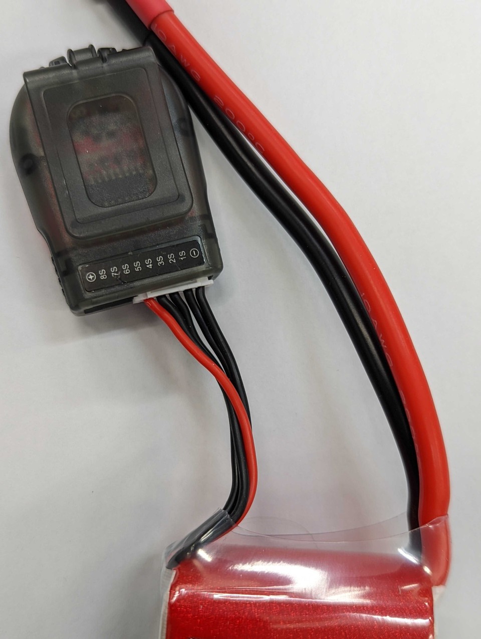 Battery monitor attached to a battery