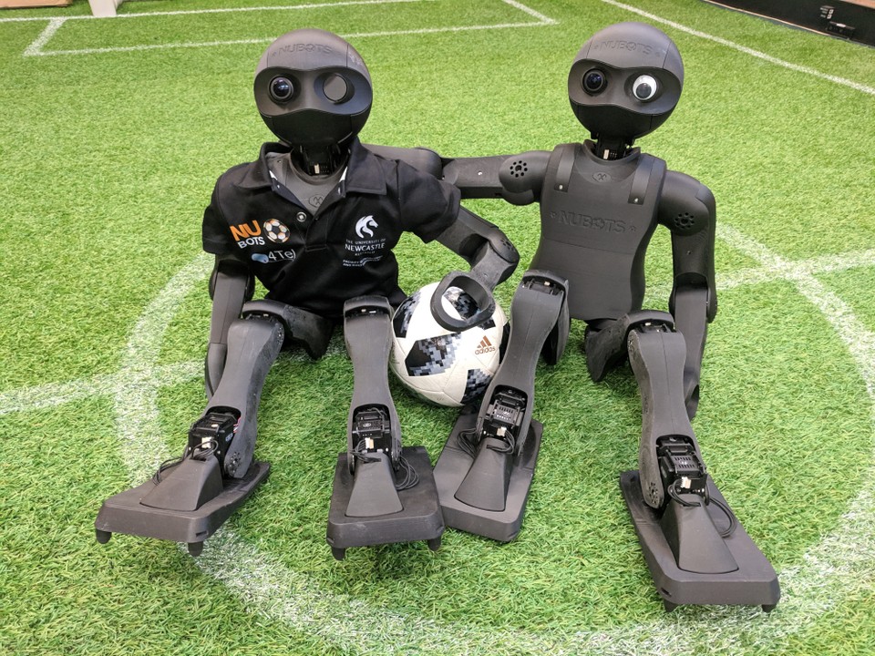 Two NUgus robots on a field