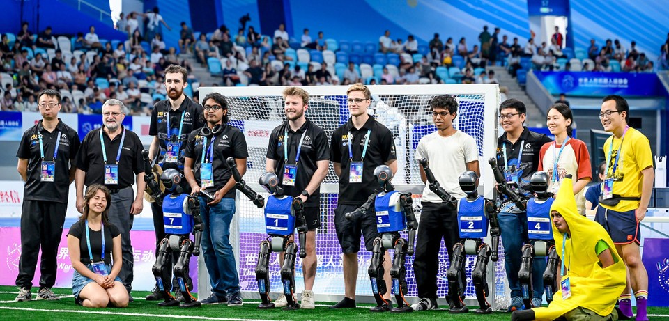 The rUNSWift + NUbots team for the 2025 World Humanoid Robot Games in Beijing