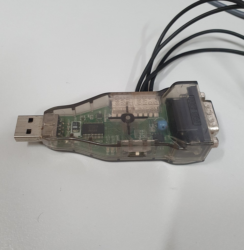 Photo of the USB2Dynamixel attachment for Dynamixel Wizard connected to a computer